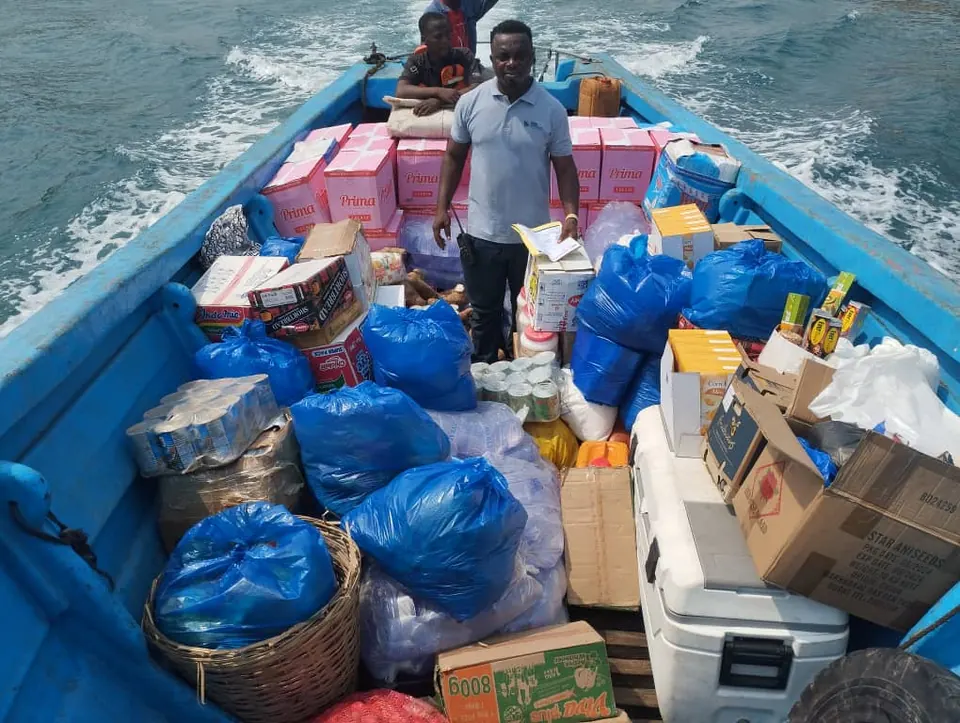 Provisions and stores on a launch for delivery to a vessel off Lomé